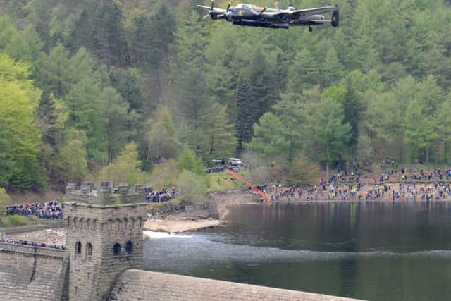 Lancaster bomber flighing over Derwent Dam in the Peak District See Story Martin Slack Picture Chris Lawton 160513