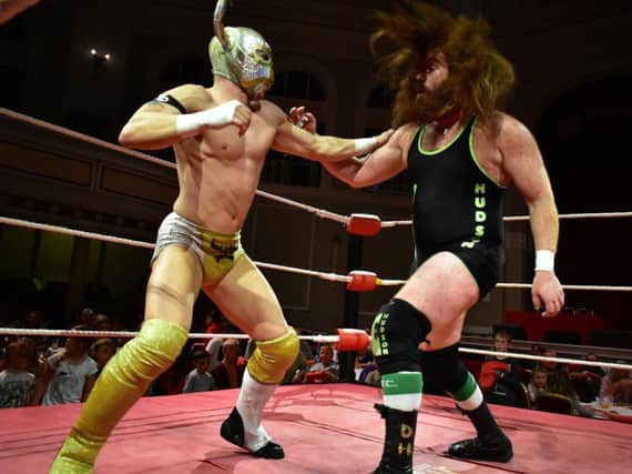 WWEs Ligero battles Danny Hudson.