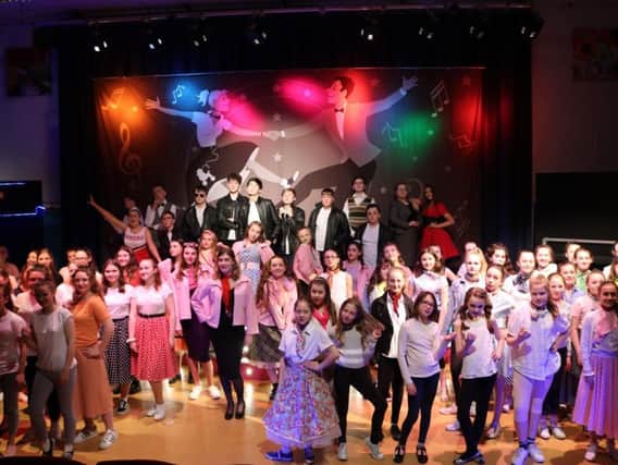 The cast of Grease at Chapel-en- le-Frith High School.