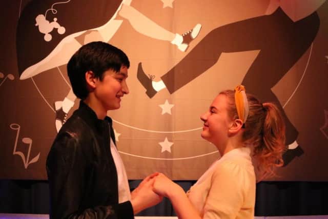 Hopelessly devoted: Luke Swainson and Issy Campbell as Danny and Sandy in Grease at Chapel-en-le-Frith High School.