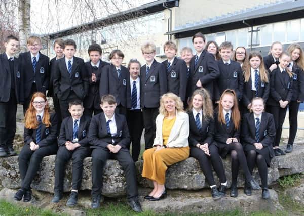 Retiring teacher Jan Heron with one of her year seven groups.