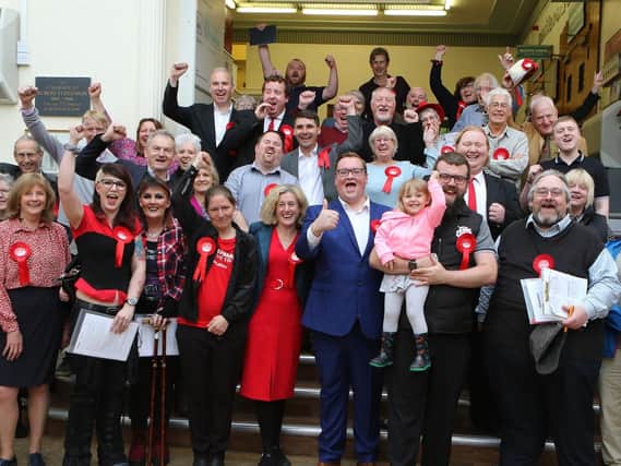 The newly-elected High Peak Labour councillors and their supporters celebrate after the count. Photo: Jason Chadwick.