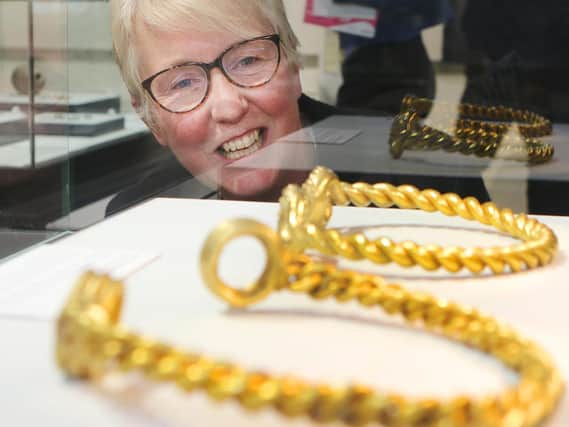 Ros Westwood MBE with some of the golden torcs. Photos: Jason Chadwick.