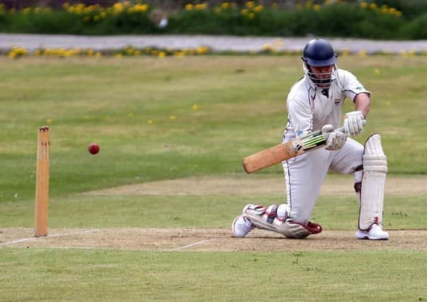 Callum Firth, who scored 56 for New Mills against Whaley Bridge.