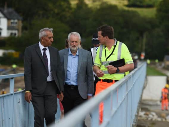 Labour leader Jeremy Corbyn has visited Toddbrook Reservoir this morning. Photo - OLI SCARFF/AFP/Getty Images