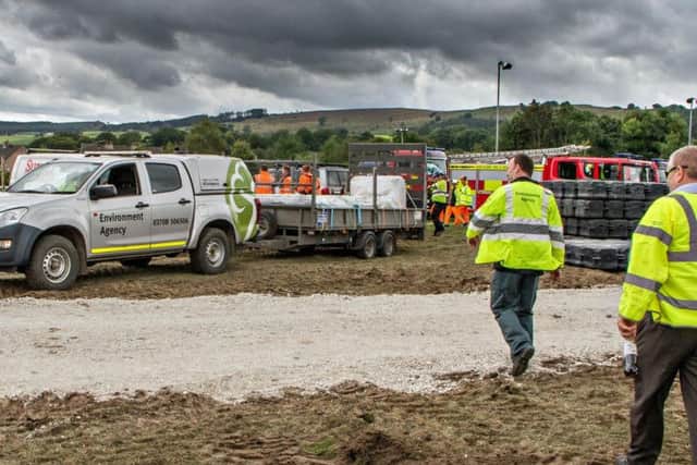 Environment Agency staff on site at Whaley Bridge