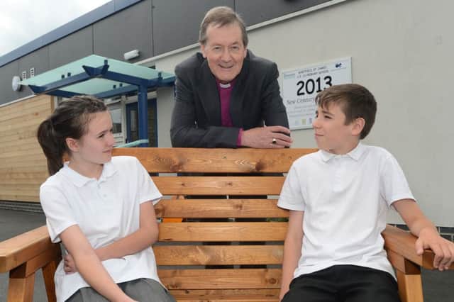 St James' Primary Glossop, the Bishop of Derby opens the new building assisted by head boy and girl William Haspenden and Elizabeth Aldridge