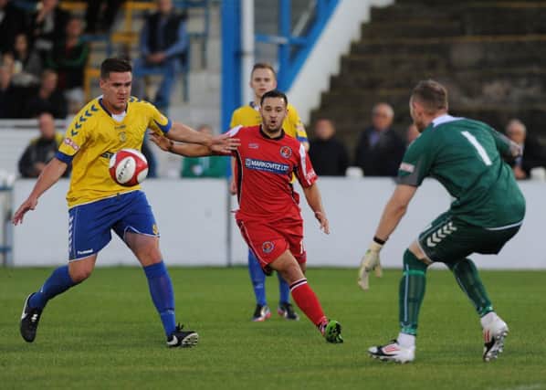 New signing Luke Dean in action for Buxton.