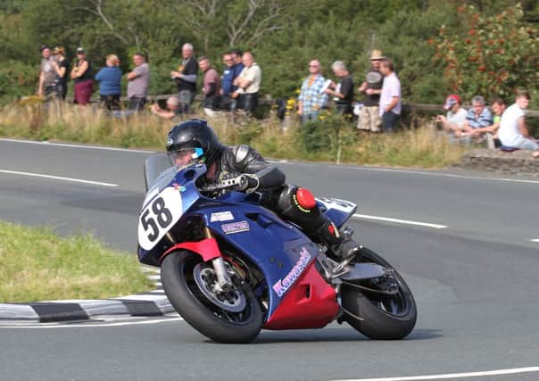 James Ford in action at The Gooseneck during the 2013 Isle of Man Formula Classic TT Race.