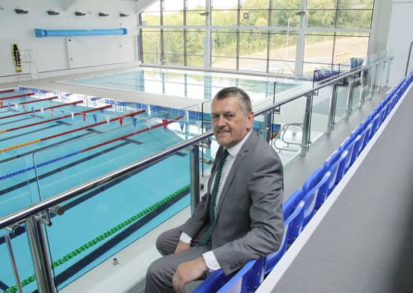 Futuristic: District Council Development Chief Dave Brooks pictured by the new swimming pool at Arc Leisure Matlock.