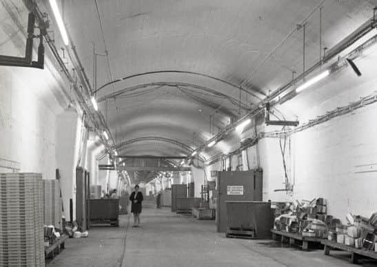 Buxton Advertiser archive, 1974, the vast wartime munitions tunnels in Harpur Hill after their conversion to the worlds largest mushroom farm