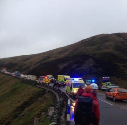 Edale and Glossop Mountain Rescue Teams were called to help rescue two walkers who had been swept away in a moorland stream and carried through a culvert under the A57 yesterday.