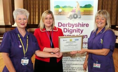 Queens Court Day Centre in Buxton has been awarded a Silver Dignity Award by Derbyshire County Council. Pictured l-r NHS/Queens Court staff member Carolyn Shaw, Derbyshire County Council Cabinet Member for Adult Social Care Councillor Clare Neill and Deputy Centre Manager Chris Whittaker.