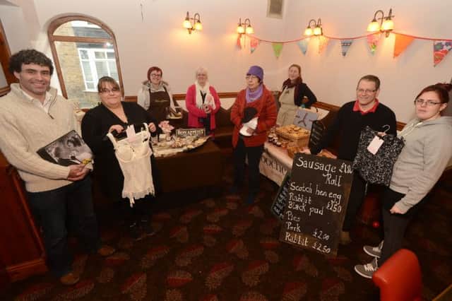 The new market being held in the former Torrs Pub New Mills, Richard Body with some of his stall holders