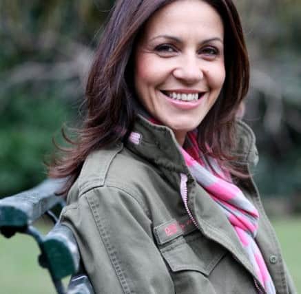 Bri0037992. The Sunday Telegraph. Portrait of British television presenter Julia Bradbury, best known for presenting Countryfile, photographed at her home in Notting Hill, west London. Wednesday February 22, 2012.