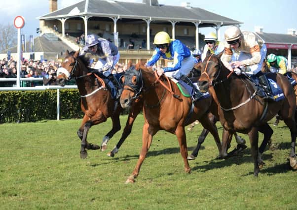 TALK OF TOWN MOOR -- Levitate (centre), ridden by Darren Egan, edges to victory in last year's Lincoln.