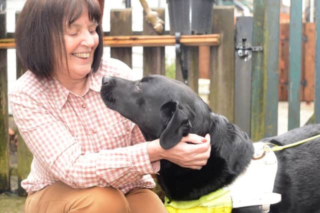 Patricia Fletcher and her guide dog Topsy