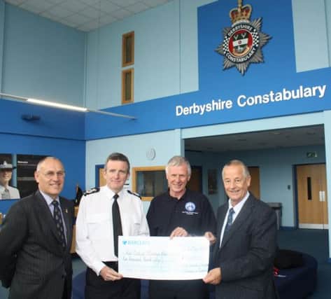 Derbyshires Chief Constable Mick Creedon and Police and Crime Commissioner Alan Charles have donated £5,000 to the Peak District Mountain Rescue Organisation, to mark their 50th anniversary this year.