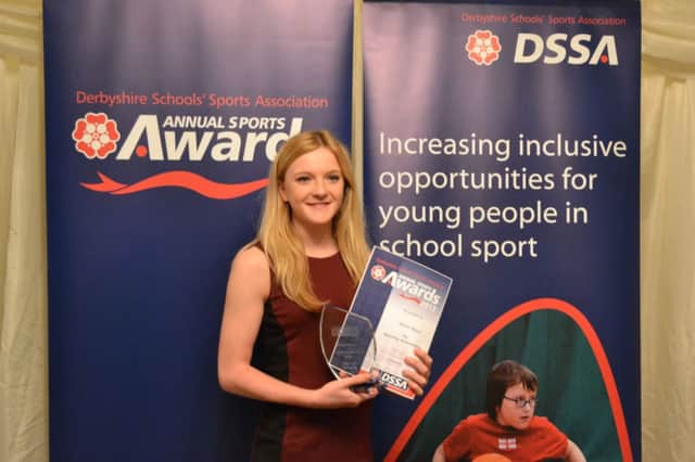 Buxton swimmer Abbie Wood with her award at the 2013 DSSA awards evening.