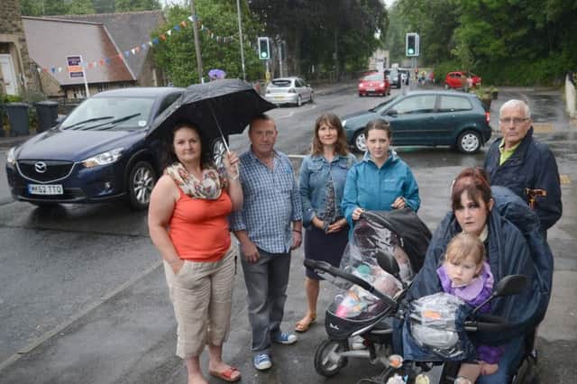 Angry Whaley Bridge residents campaigning for a reduction of traffic on Buxton Rd