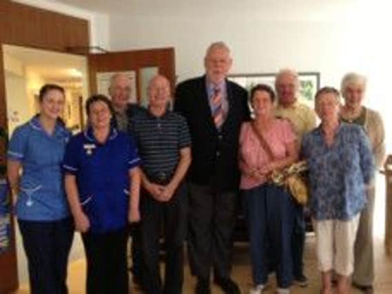 Terry Waite with Buxton residents Pauline & David Wood, Robin & Dorothy Garrett, Iris & Edwin Armett and nursing staff. Photo contributed.