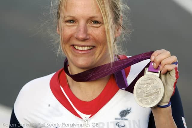 Karen Darke poses with the silver medal she won in the womens Individual H1-2 time Trial. Photo: Phil Searle/ParalympicsGB.