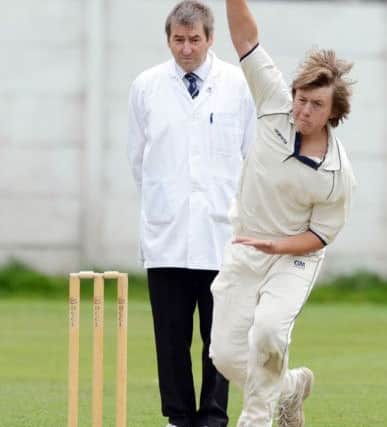 New Mills cc v Buxton cc. Buxton bowler Andrew Slater.