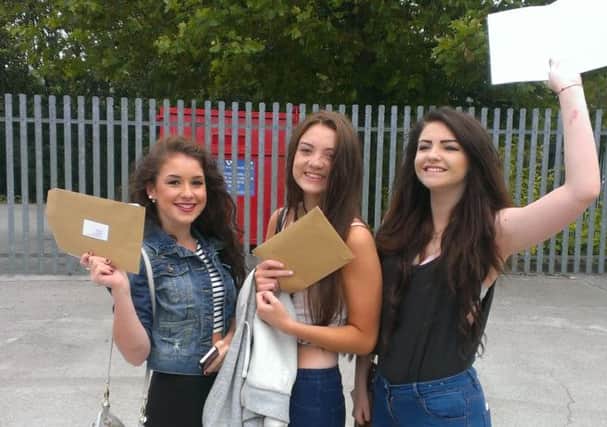 Mataya Flanagan, Natasha Jordan and Megan Critchlow celebrate their GCSE results at St Philip Howard Catholic School in Glossop.