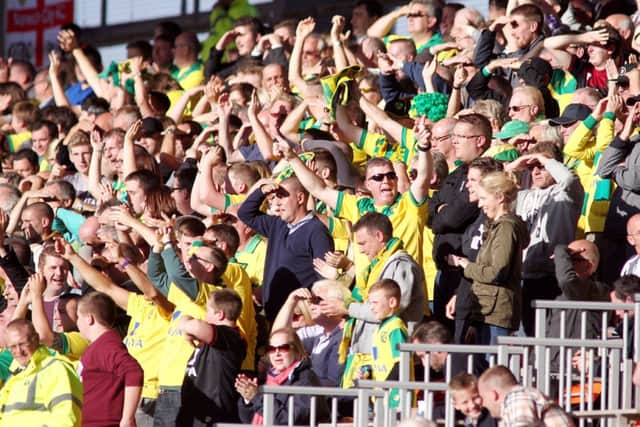 Norwich City fans celebrate as their side take the lead with their second goal

Photographer Rich Linley/CameraSport

Football - The Football League Sky Bet Championship - Blackpool v Norwich City - Saturday 27th September 2014 - Bloomfield Road - Blackpool

© CameraSport - 43 Linden Ave. Countesthorpe. Leicester. England. LE8 5PG - Tel: +44 (0) 116 277 4147 - admin@camerasport.com - www.camerasport.com