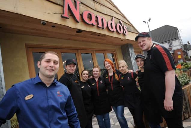 Nando's store manager Craig Clare with his staff.