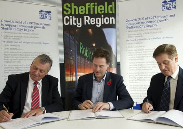 Coun Eion Watts, Deputy Prime Minister Nick Clegg and LEP chairman James Newman sign £300m Growth Deal.