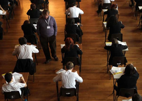Students sit their exams