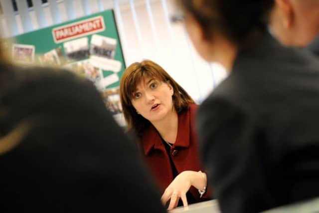 Education Secretary, Nicky Morgan, pictured with staff members during her visit to the Netherthorpe School in Staveley on Thursday.