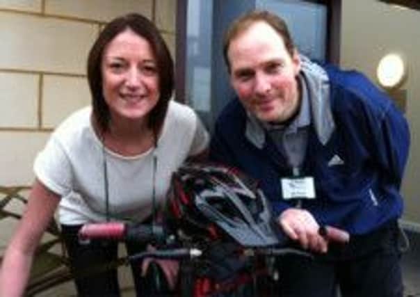 Ashgate Hospice's Alison Ward-Foster and JE James's Dean Poole prepare for the DT Flagg Challenge cycle fundraiser.