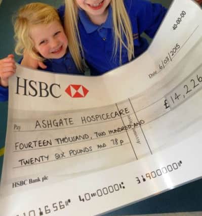 Ruby and Kitty with the cheque.