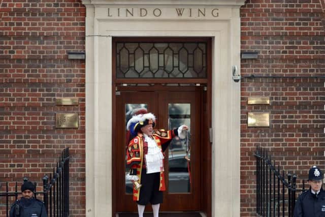 Town crier Tony Appleton proclaims the birth of the second child to the Duke and Duchess of Cambridge, outside the Lindo Wing of St Mary's Hospital in Paddington, west London. PRESS ASSOCIATION Photo. Picture date: Saturday May 2, 2015. See PA story ROYAL Baby. Photo credit should read: Anthony Devlin/PA Wire