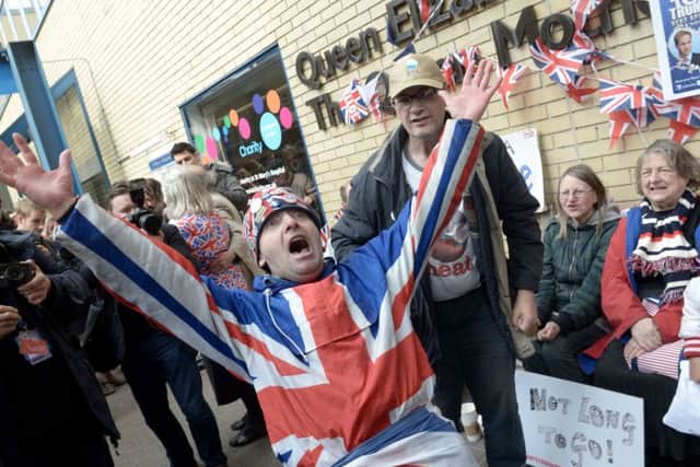 Well wishers celebrates the announcement of the birth of the second child to the Duke and Duchess of Cambridge, outside the Lindo Wing of St Mary's hospital as the Duchess of Cambridge has been admitted after going into labour this morning, London. PRESS ASSOCIATION Photo. Picture date: Saturday May 2, 2015. See PA story ROYAL Baby. Photo credit should read: Anthony Devlin/PA Wire