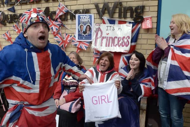 Well wishers celebrates the announcement of the birth of the second child to the Duke and Duchess of Cambridge, outside the Lindo Wing of St Mary's hospital as the Duchess of Cambridge has been admitted after going into labour this morning, London. PRESS ASSOCIATION Photo. Picture date: Saturday May 2, 2015. See PA story ROYAL Baby. Photo credit should read: Anthony Devlin/PA Wire