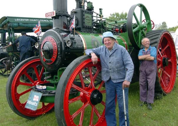 Belper steam rally held at Street lane denby. John Bosworth and Tiffer Bosworth from Smalley with a foster agricultural steam engine.