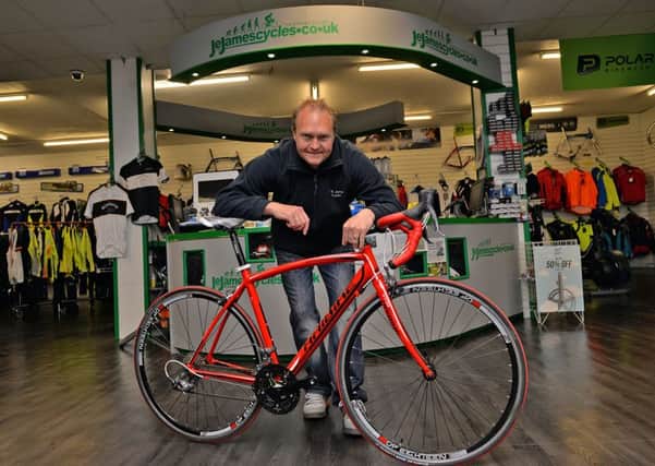 Cycle specialists JE James have donated a racing bike as a prize for the Derbyshire Times Flagg Cycle Challenge, raising funds for Chesterfields Ashgate Hospice, pictured is Mick Burr with the prize bike