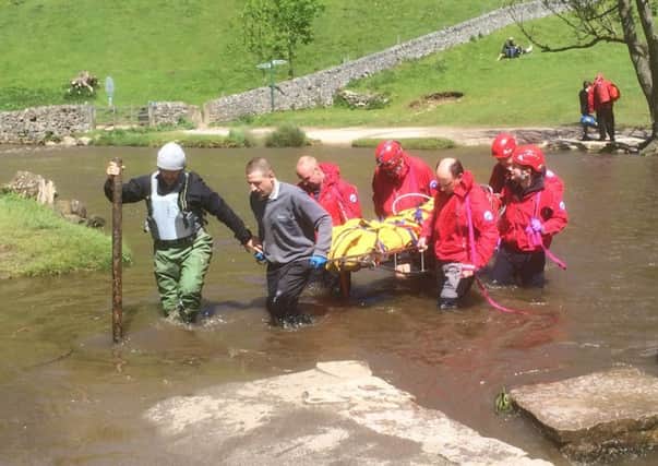 12 Mountain Rescue members helped a women get medical attention on Thrope Cloud.