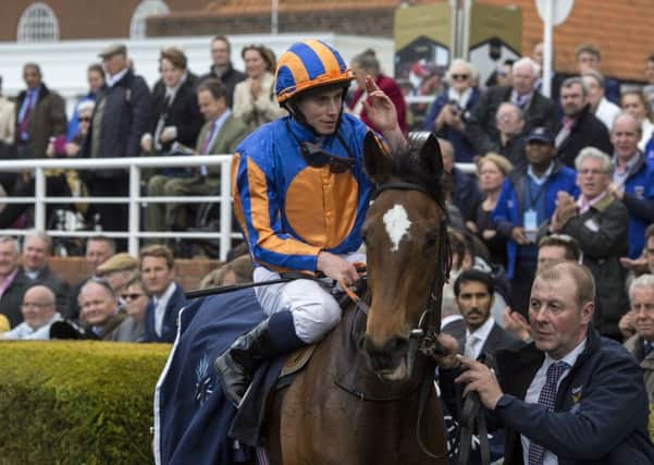 MOORE THE MERRIER -- Investec Oaks favourite Legatissimo, with Ryan Moore up, after winning the Qipco 1,000 Guineas at Newmarket last month (PHOTO BY: Julian Herbert/PA Wire).
