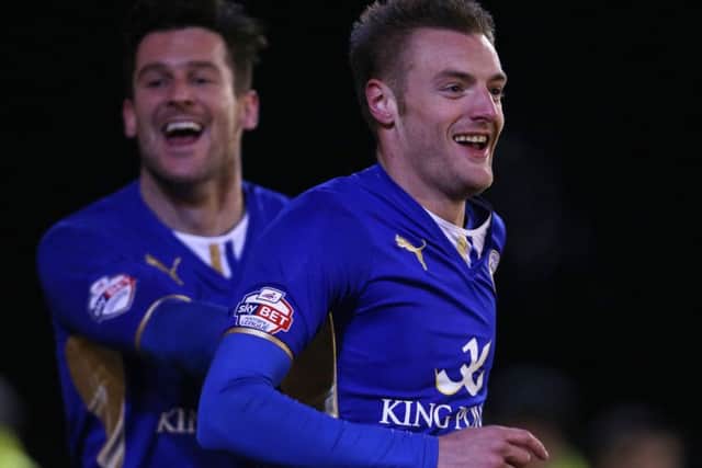 Leicester City's Jamie Vardy (right) celebrates scoring against Barnsley.