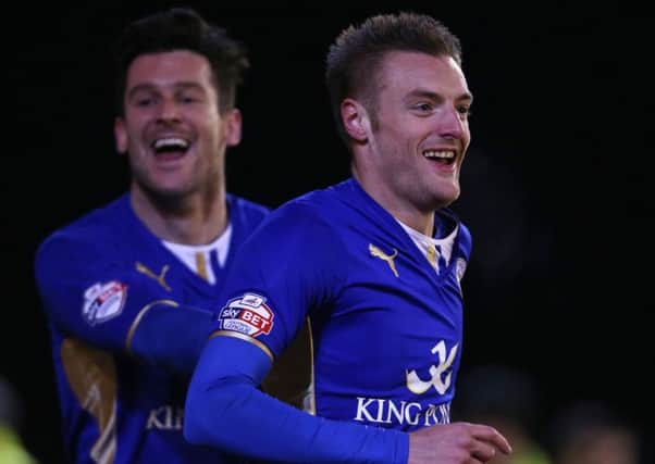 Leicester City's Jamie Vardy (right) celebrates scoring against Barnsley.