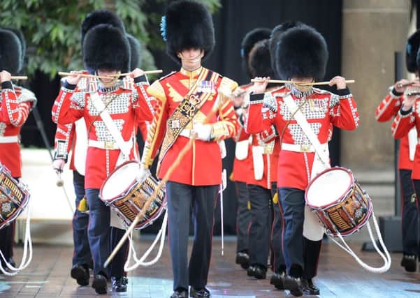 The band of the Irish Guards, performing at the 2013 Buxton Military Tattoo.