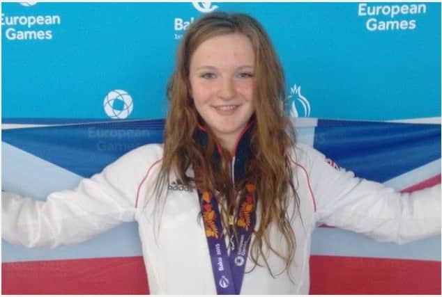 Buxton's Abbie Wood celebrates her gold in the 400m IM at the European Games in Azerbaijan.