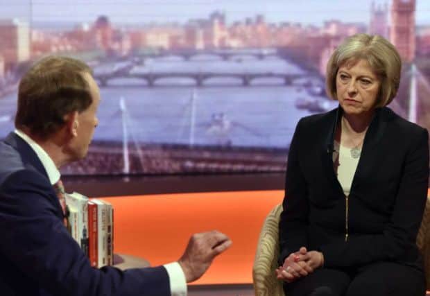 Home Secretary Theresa May (right) speaking with Andrew Marr while appearing on BBC One's The Andrew Marr Show. Photo: PRESS ASSOCIATION