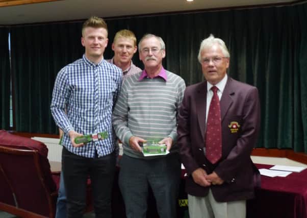 WINNERS -- captain Ian Waite with the Captain's Prize team winners, Aaron Watson, Craig Longmore and Mick Harrison.