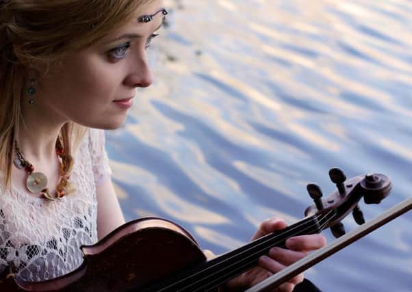 Emma Sweeney, fiddle player and singer, brings her trio to St George's Church, New Mills, on September 17