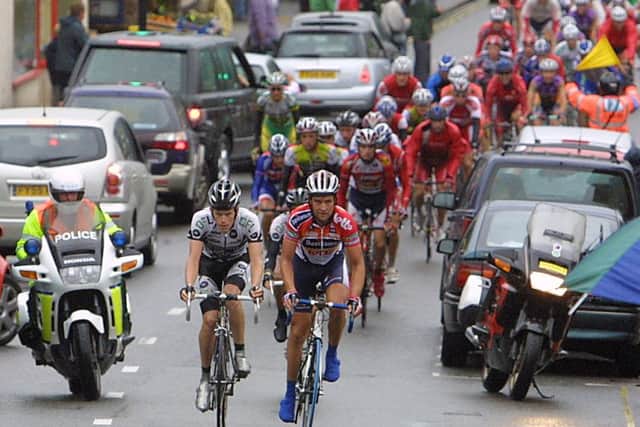 Hathersage, Tour of Britain, the main peleton pass through Hathersage